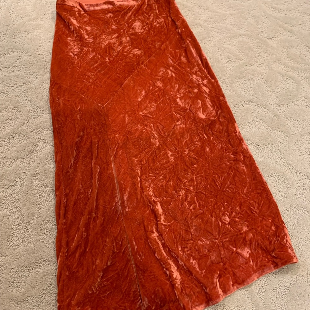 Crushed velvet a-line skirt w/ slit. measures 33” approx from waistband to hem.
